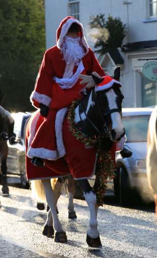 A man dressed as Santa joins in the Cheshire Hunt 