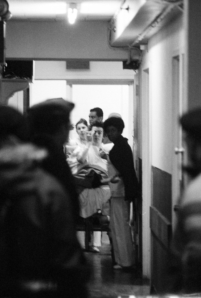 John Ritchie, known as Sid Vicious of the punk rock group the Sex Pistols, is wheeled through the corridor at Jamaica Hospital in Queens, N.Y., Jan. 19, 1978 where he had been taken from a airplane flight which arrived in New York from Los Angeles. A spokesman of the Port Authority of New York and New Jersey, which runs Kennedy Airport, confirmed that an airport doctor diagnosed a drug overdose, but the airport declined to discuss the case on the ground that all cases were confidential. (AP Photo/Ira Schwarz)