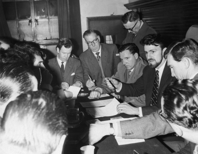 10th January 1961: Jimmy Hill, President of the Professional Footballers' Association, talks to members of the press at St Pancras Town Hall, London. The topic in question is the threatened football players' strike. (Photo by Douglas Miller/Keystone/Getty Images)